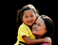 Karen mother and daughter smiling