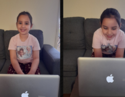 Little girl captured with new laptop.