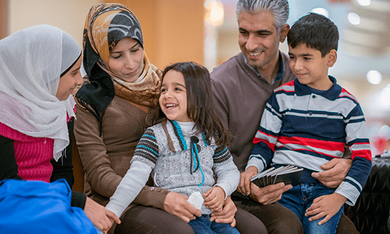 Refugee family smiling