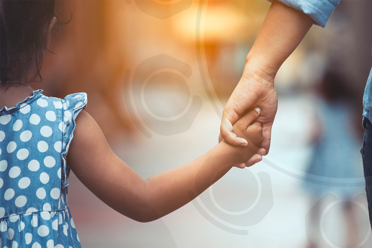 Man holding a little girl's hand