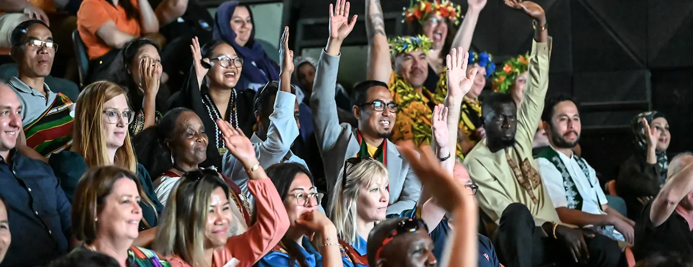 SSI World of Cultures Festival Queensland crowd raising hands to answer questions