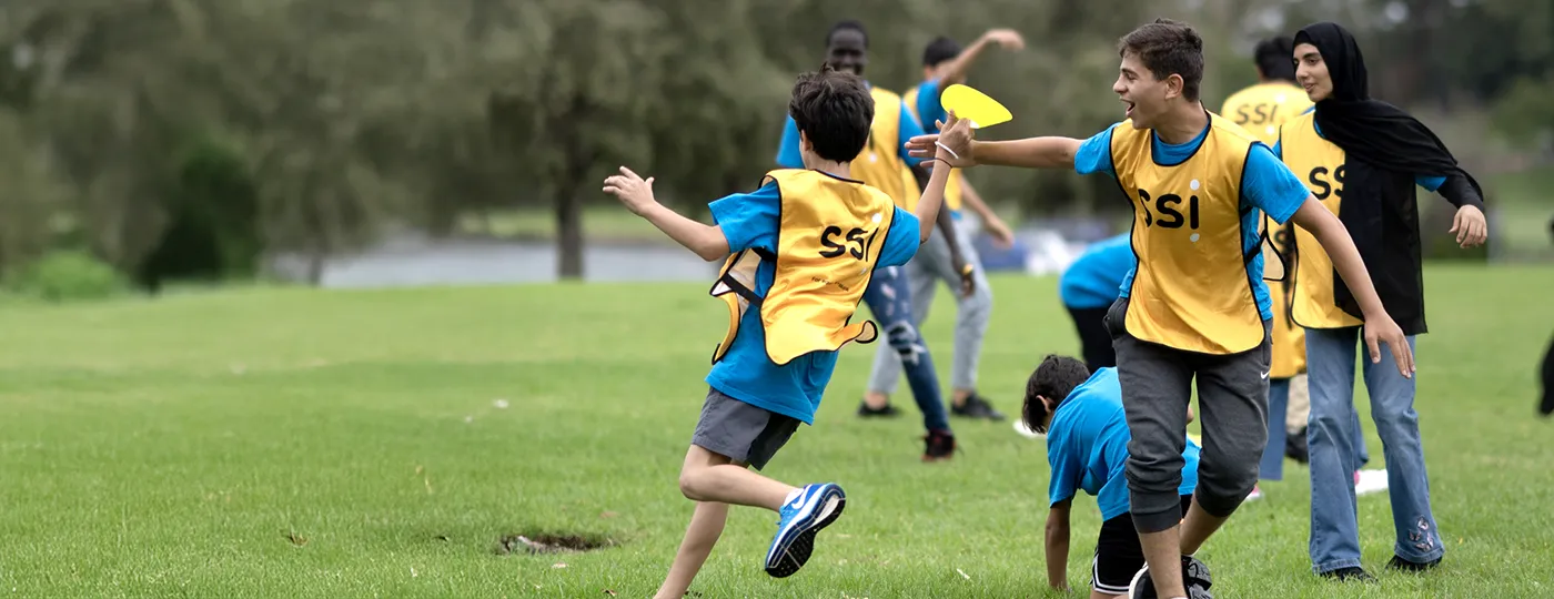SSI community event in Sydney featuring children from the Humanitarian Settlement Program playing sport