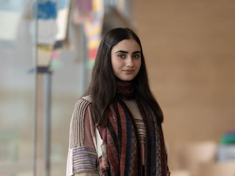 Hosna, artist from SSI Creative Compass program and Beyond Borders exhibition