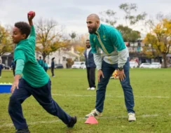 Cricketer Fawad Ahmed with school kids Refugee Week in Melbourne